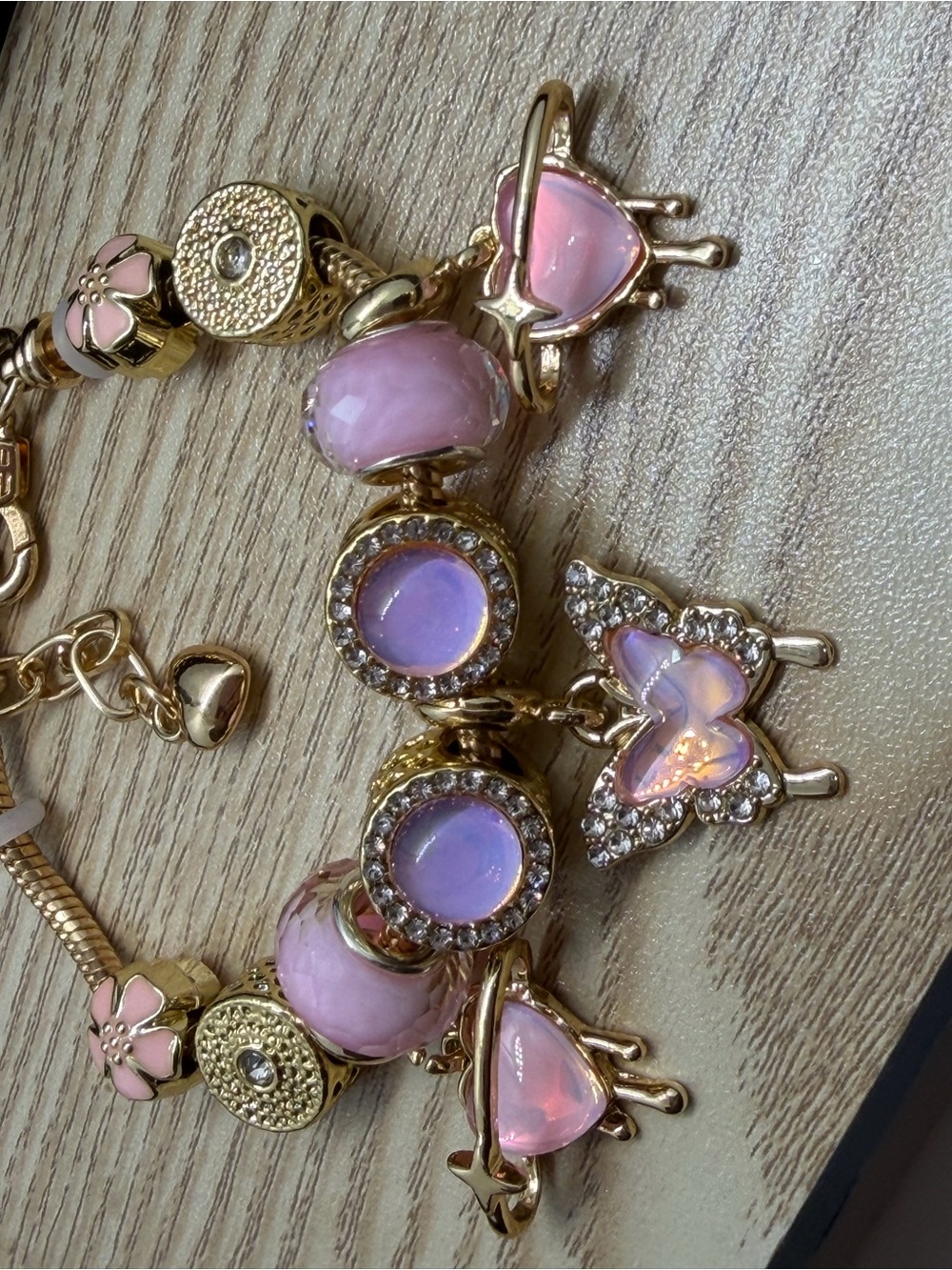 Gold Tone Pink Charm Bracelet with Opalescent and Crystal Accents